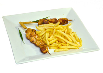Chicken kebab with French fries