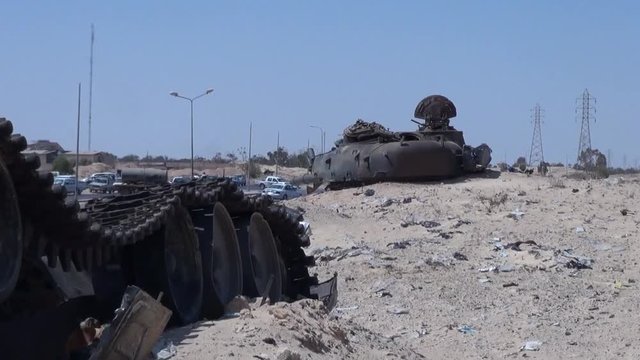 a war betwean Gaddafi army and  Libya's Transitional National Council  army with air support from NATO started on the 17 March 2011