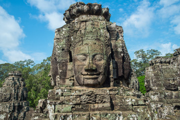 Fototapeta na wymiar The mystery face towers in Bayon temple, temple of King Jayavarman VII. The faces were believed to represent Brahma, the Hindu God of creation but some believe that it is the King himself. 