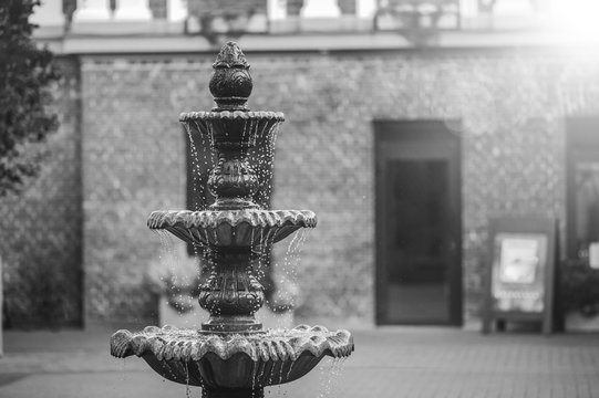 Stone three-tier fountain - Powered by Adobe