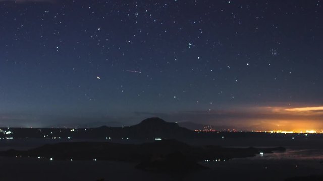 Night time lapse and night full of stars by Lake Taal vantage point Tagaytay City, Philippines. Astro time lapse wide shot. Available in four K resolution.