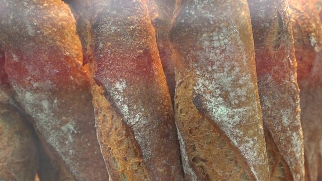 Baguettes being displayed in a window shop in Paris