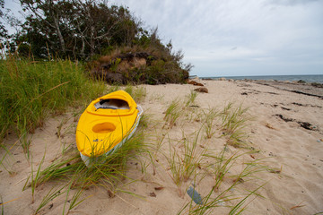 Stranded kayak on beach