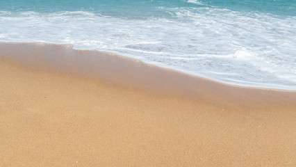 Fototapeta na wymiar Tropical beach and sea wave