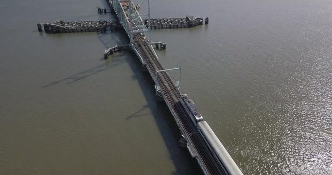 A train drives over a Bridge across the Raritan River in Perth Amboy.