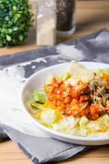 Korean spicy chicken with sauteed cabbage 