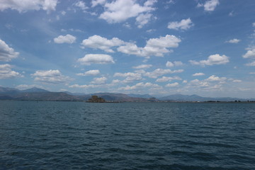 Old venetian fortress Bourtzi and surrounding landscape, Nafplio, Peloponnese, Greece