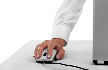 Fototapeta premium Closeup of Woman's Hand Using a Mouse