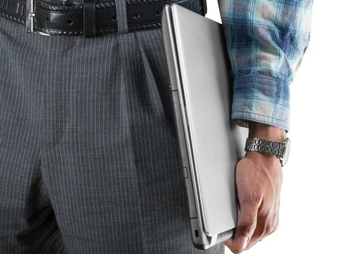 Closeup of a Man's Hand Holding a Laptop