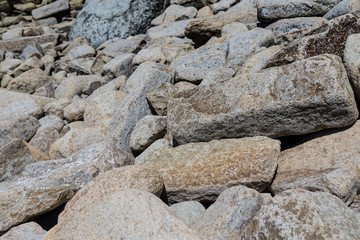 Cape Stolbchaty. Cape on the west coast of the island of Kunashir. It is composed of layers of basaltic lavas of the Mendeleyev volcano.