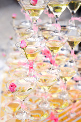 Pyramid from glasses of champagne on wedding ceremony