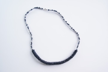 Fototapeta premium Handmade necklace on white