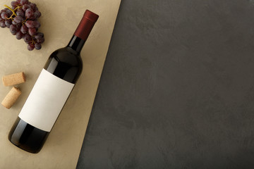 Bottle of red wine with label.