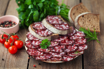 delicious sausage sliced in a plate
