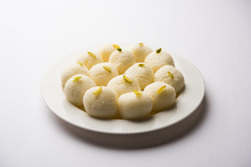 Indian Rasgulla or Rosogulla dessert/sweet served in a bowl. selective focus