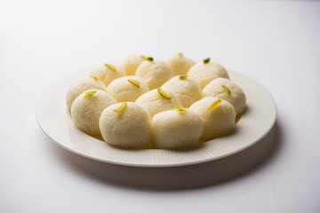 Indian Rasgulla or Rosogulla dessert/sweet served in a bowl. selective focus