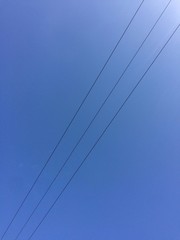 Cable power line blue sky background