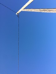 Obraz premium Cable power line blue sky background