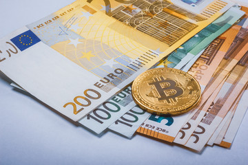 Bitcoin BTC and Cash Euro bills
