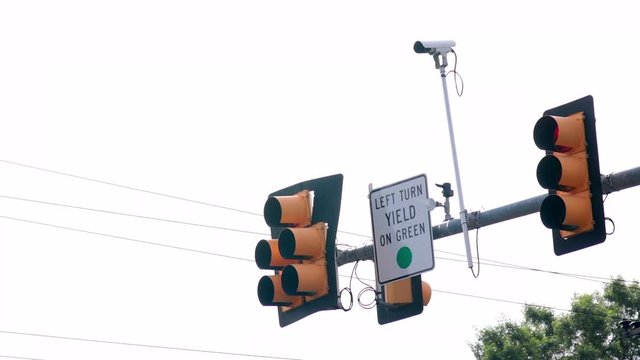 Traffic lights left framed with traffic cam red to green