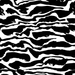 Brush painted zebra seamless pattern. Black and white stripes grunge background.