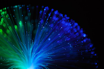 Abstract background a Optical fiber lamp. Closeup of colorful optical fibers