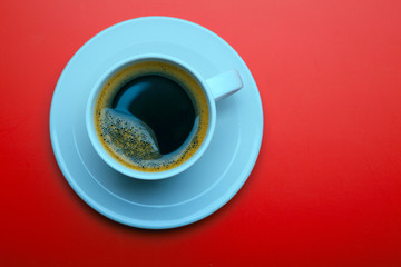 Cup of black coffee on table top view, flat lay, mock up. Cup of Black Coffee in White Ceramic Cup on plastic Tabletop