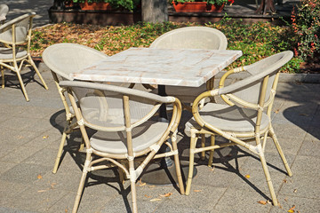 Fototapeta na wymiar Restaurant chairs and table outdoor