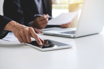Co working conference, Business team meeting present, investor colleagues discussing new plan financial graph data on office table with laptop and digital tablet, Finance, accounting, investment