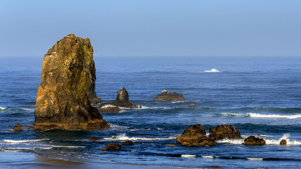 Fototapeta na wymiar View of the Oregon Coast with it's sea stacks after sunset . Travel USA. 