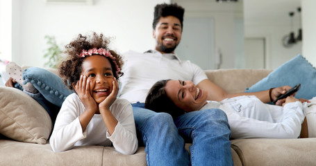 Picture of happy family having fun time together