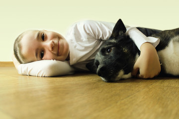 Boy with dog. Friendship.