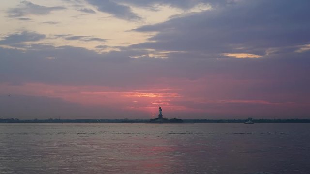 4k Sunset Time lapse Footage shot on Sony a7rii in H265 of the Statue Of Liberty in New York city.