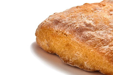 traditional italian wheat bread ciabatta cooked with olive oil on white background. Closeup
