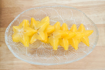 sliced star fruit on glass dish for eat