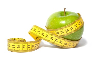 A Green Apple and a Measuring Tape