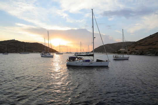 Beautiful evening and sailboats in Kolona double bay Kythnos island Cyclades Greece.