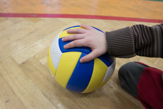 The tailor volleyball in the school gym