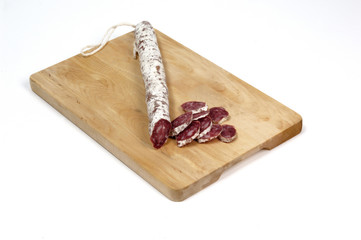 sausage (fuet)  isolated on white