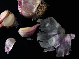 garlic on a dark background, close-up