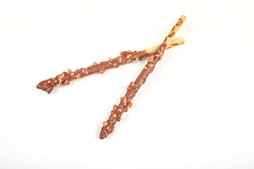 Biscuit stick with chocolate and almond isolated on white background.