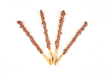 Biscuit stick with chocolate and almond isolated on white background.