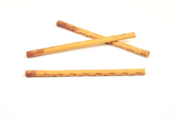 biscuit sticks with sweet filling on white background.
