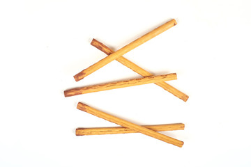 biscuit sticks with sweet filling on white background.