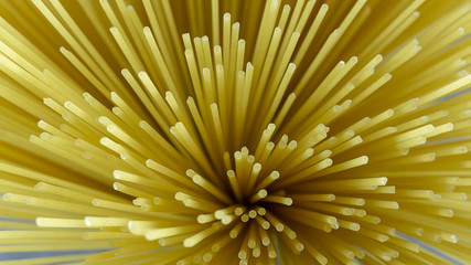 Spaghetti yellow italian pasta line pattern food background concept,Close up Top View..