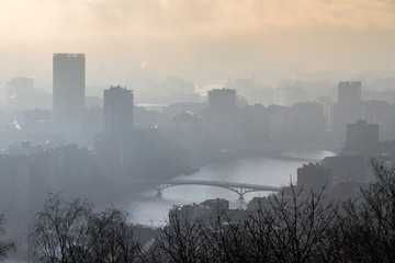 Beautiful cityscape view of the skyline of Liege, Belgium, with the river Meuse on a sunny and hazy winter day seen from the top of the Montagne de Bueren