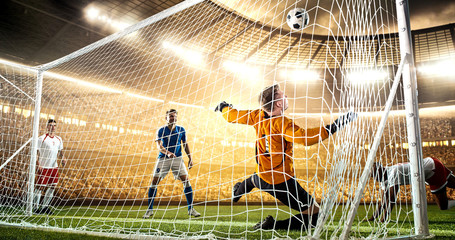 Intense soccer moment in front of the goal on the professional soccer stadium.