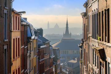 Beautiful urban cityscape see through with a view over Liege, Belgium, from one of the street...