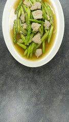 Thai food. Stir fried bamboo shoots on stone background.Top view, Copy space for design. .