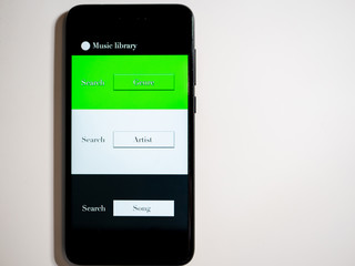 Isolated phone with music download app in white background. Concept